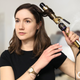 Illustration for article titled Conair Releases New Double-Sided Curling Iron For Flawless Burnsem/em